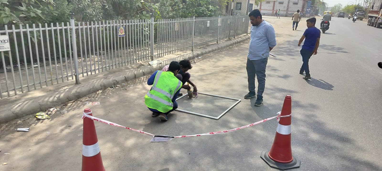 HydroLabs field team measuring road silt load on a city street